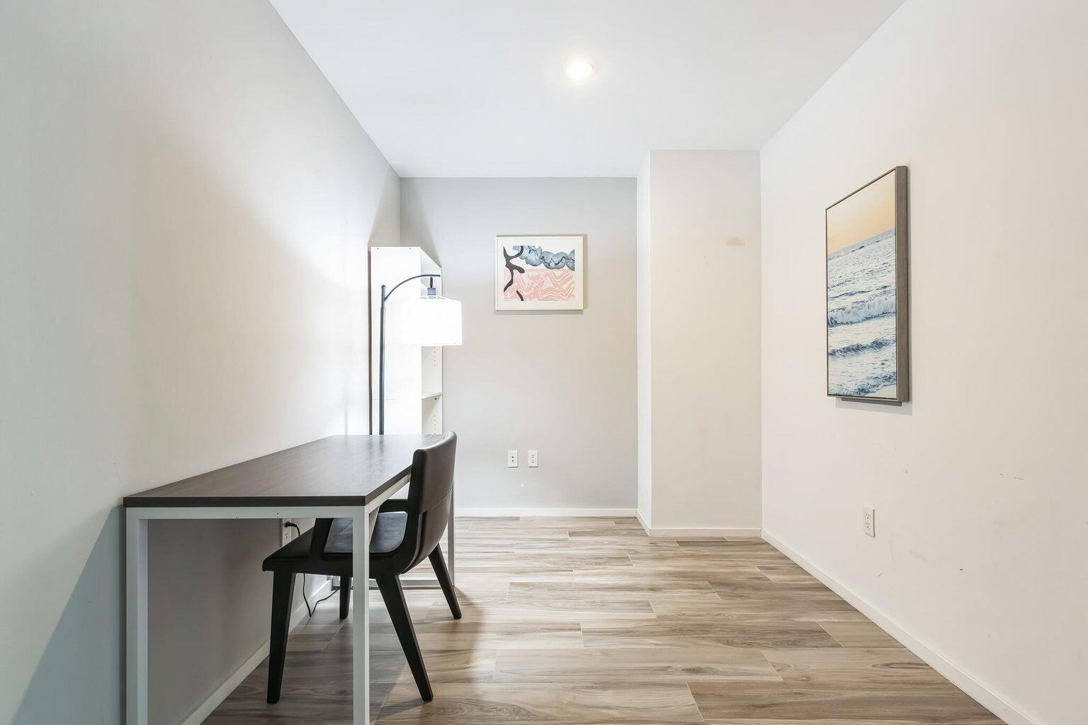 801 South Miami Avenue, Unit 3607 Miami, FL 33131 - Photo 34 of 38 a workspace with furniture and window