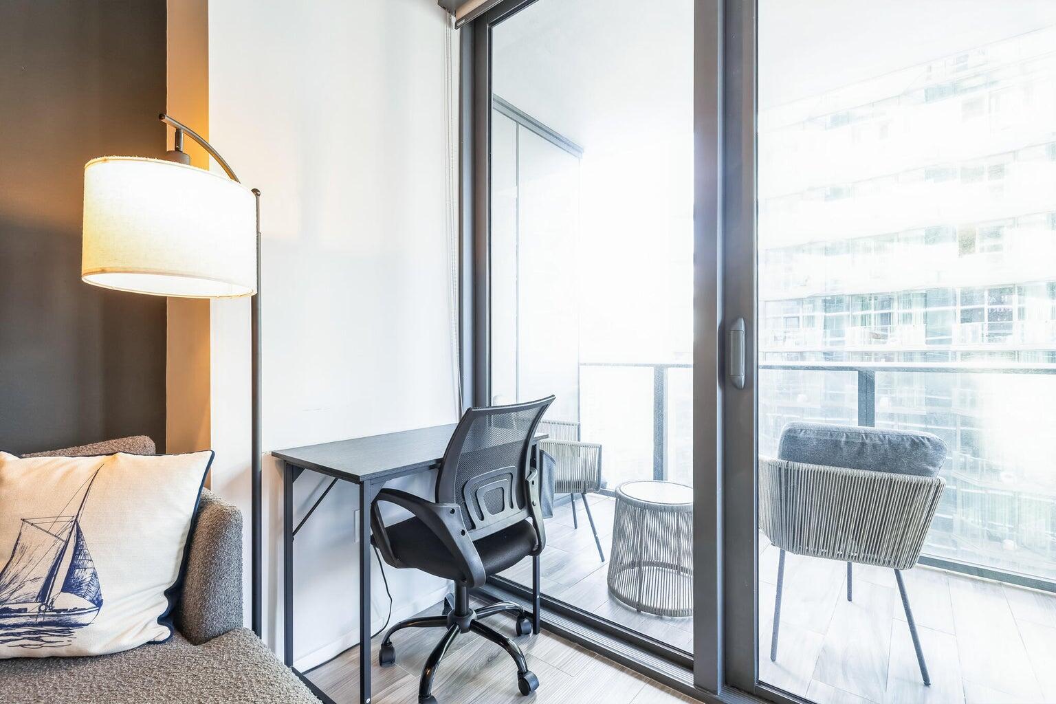 801 South Miami Avenue, Unit 3607 Miami, FL 33131 - Photo 35 of 38 a view of a room with a table and chairs