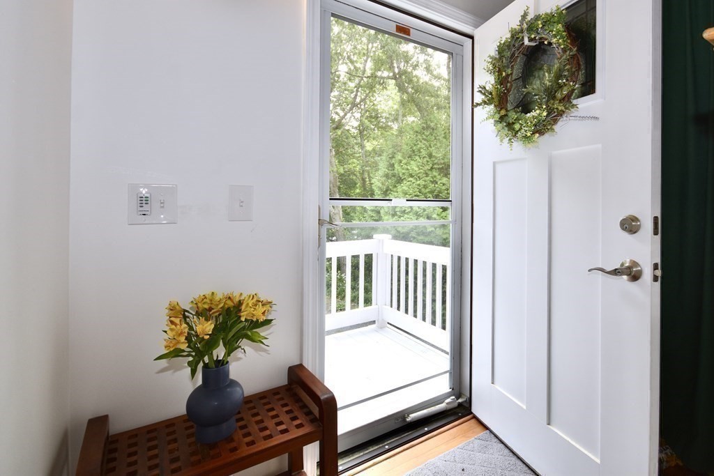 29 Tecumseh Road Bourne, MA 02562 - Photo 11 of 28 a view of a room with wooden floor and a potted plant