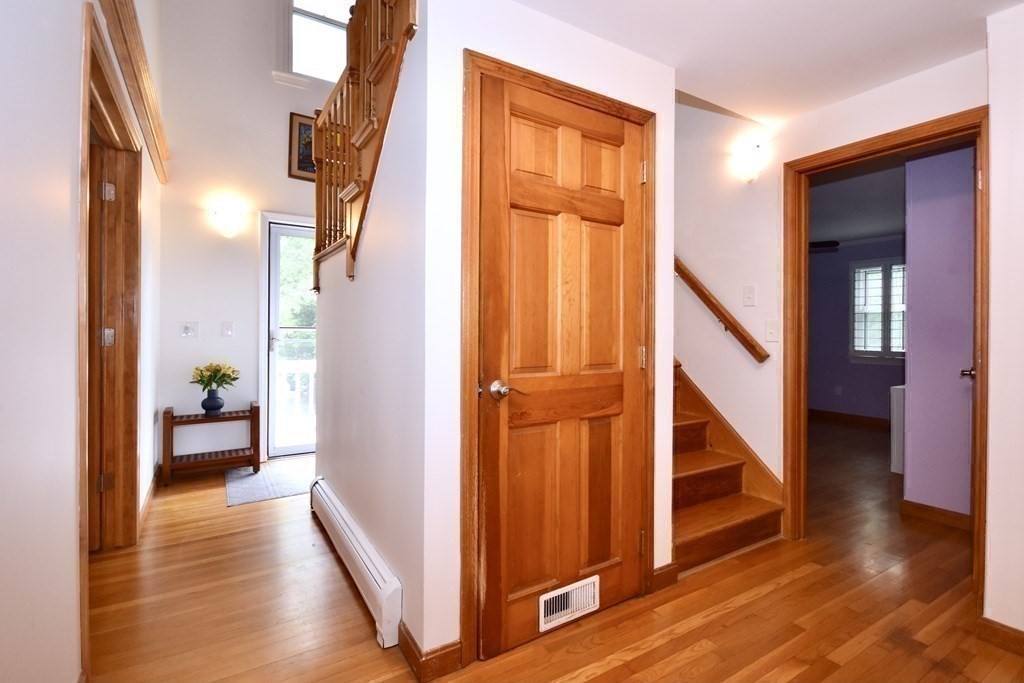 29 Tecumseh Road Bourne, MA 02562 - Photo 13 of 28 a view of an entryway with wooden floor and a livingroom