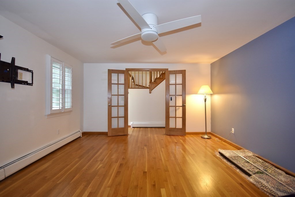 29 Tecumseh Road Bourne, MA 02562 - Photo 17 of 28 wooden floor in an empty room with a window