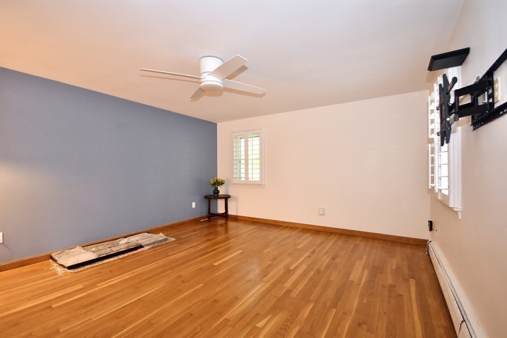29 Tecumseh Road Bourne, MA 02562 - Photo 18 of 28 a view of an empty room with window and wooden floor