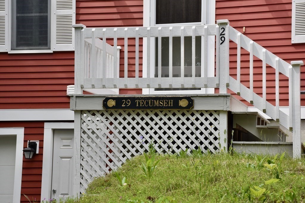 29 Tecumseh Road Bourne, MA 02562 - Photo 4 of 28 a view of a house with a small deck