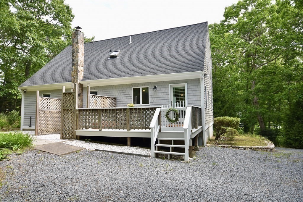 29 Tecumseh Road Bourne, MA 02562 - Photo 7 of 28 front view of house with a yard