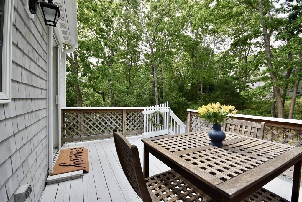 29 Tecumseh Road Bourne, MA 02562 - Photo 9 of 28 a view of a roof deck with furniture