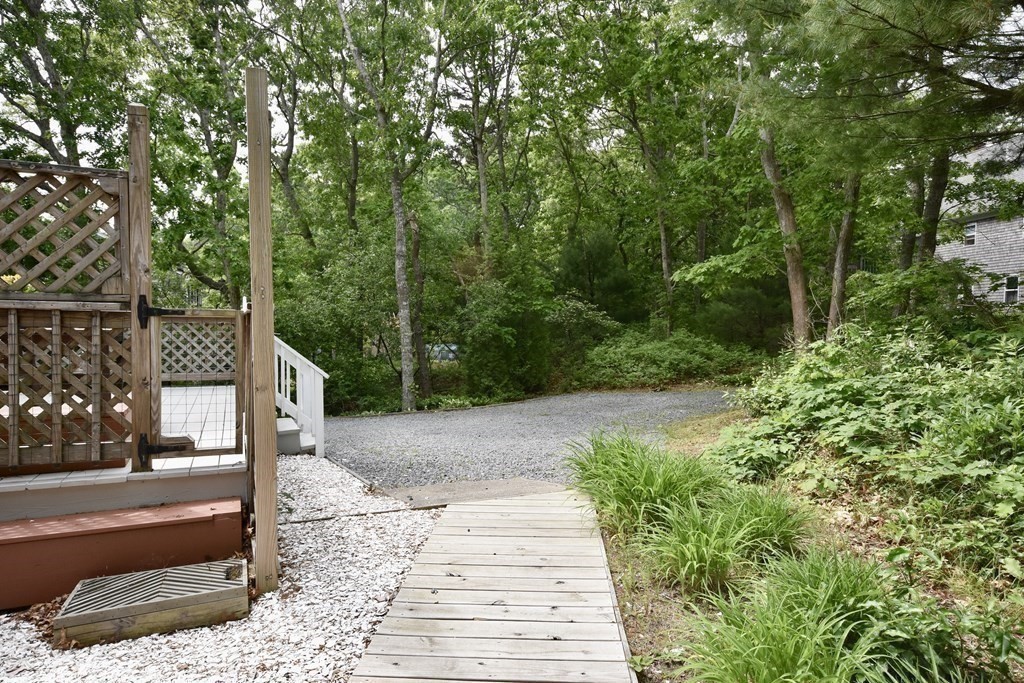 29 Tecumseh Road Bourne, MA 02562 - Photo 10 of 28 a view of a pathway of a patio