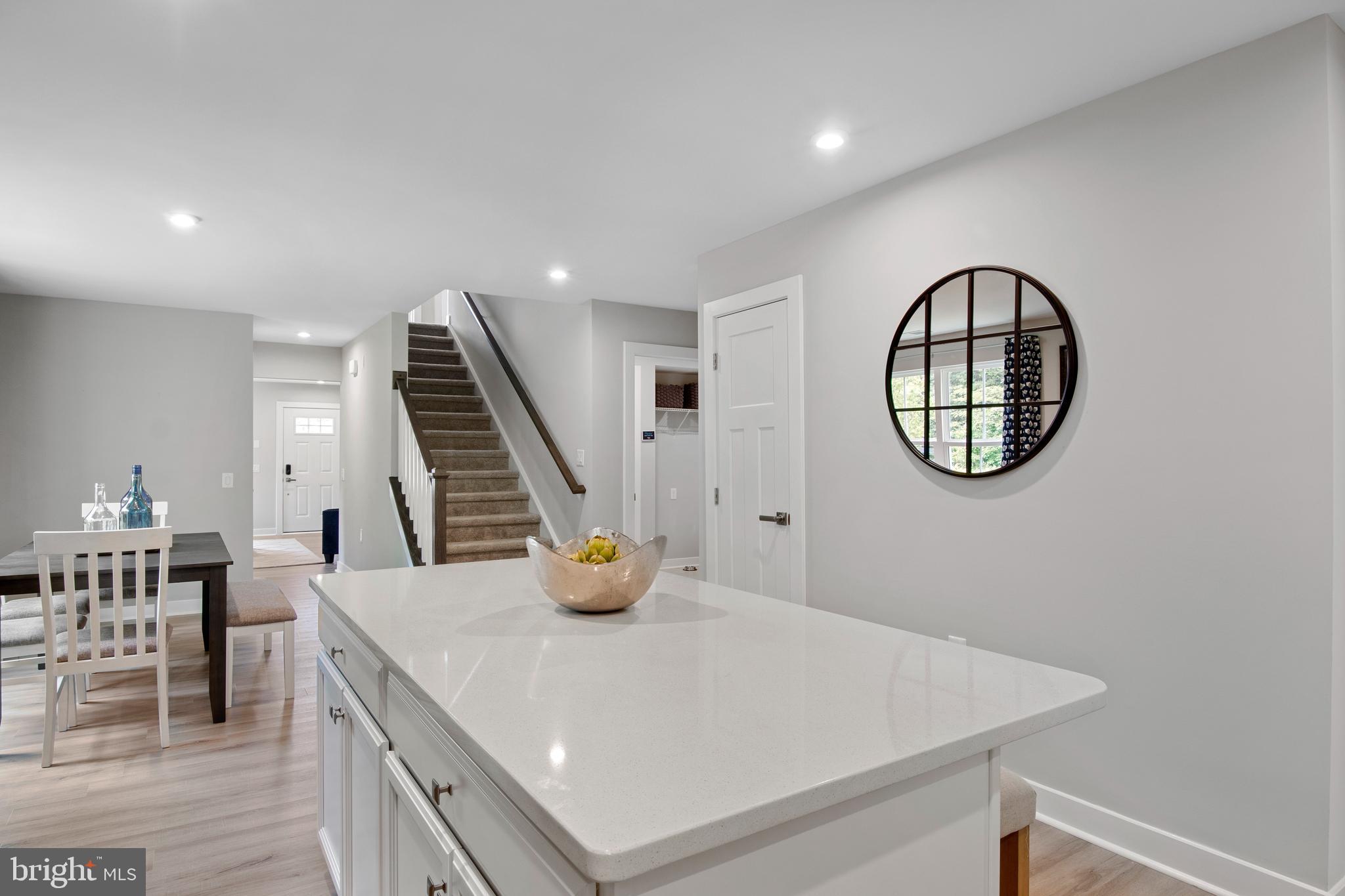 14306 Longhouse Loop, Unit B Brandywine, MD 20613 - Photo 5 of 22 KITCHEN ISLAND W/OPTIONAL QUARTZ COUNTERTOP
