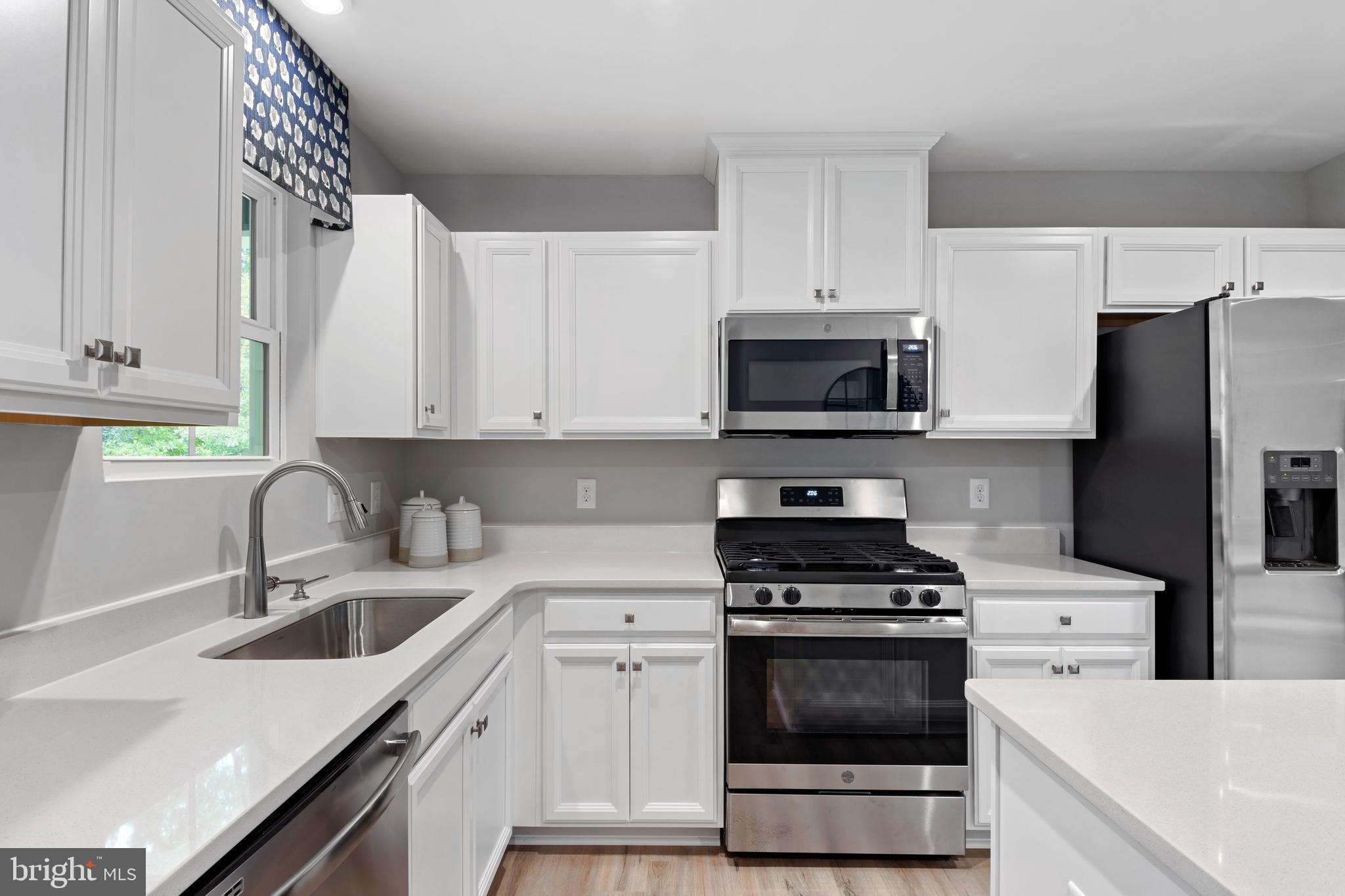 14306 Longhouse Loop, Unit B Brandywine, MD 20613 - Photo 8 of 22 KITCHEN W/STAINLESS STEEL APPLIANCES