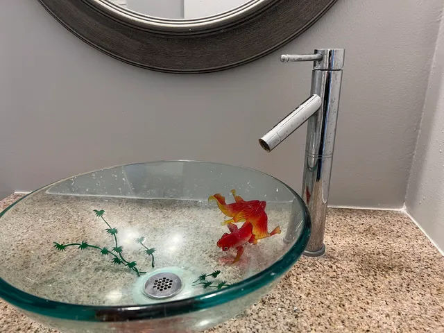 a kitchen with a sink and a window