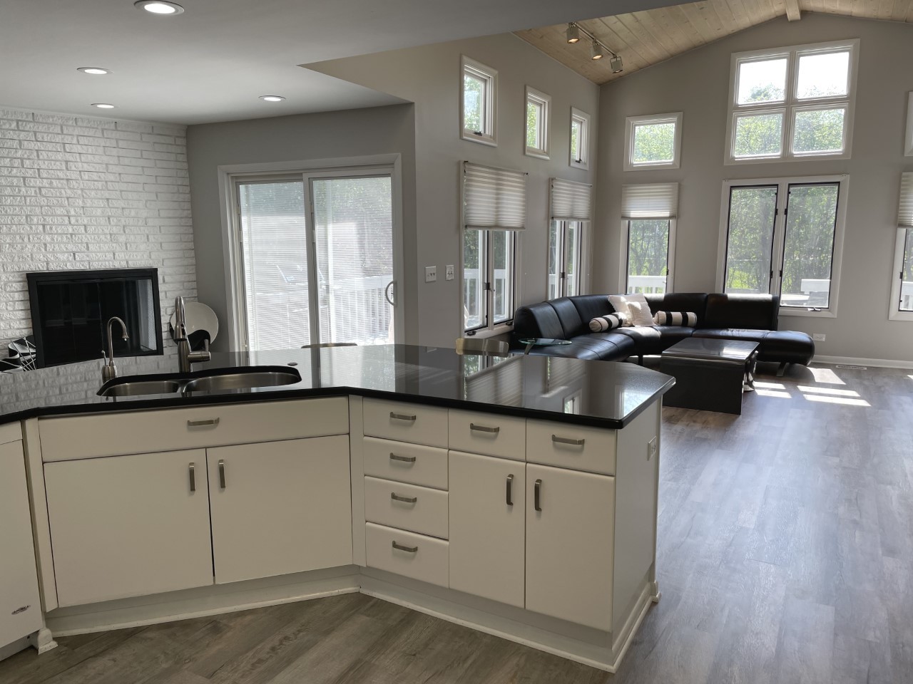 1958 McCraren Road Highland Park, IL 60035 - Photo 11 of 23 a kitchen with granite countertop a sink and white cabinets