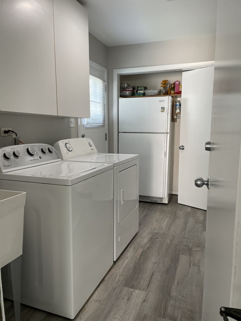 1958 McCraren Road Highland Park, IL 60035 - Photo 14 of 23 a utility room with dryer and washer