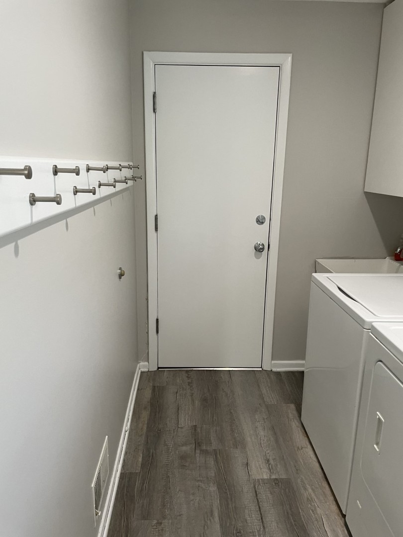 1958 McCraren Road Highland Park, IL 60035 - Photo 15 of 23 a view of a storage and utility room with washer and dryer