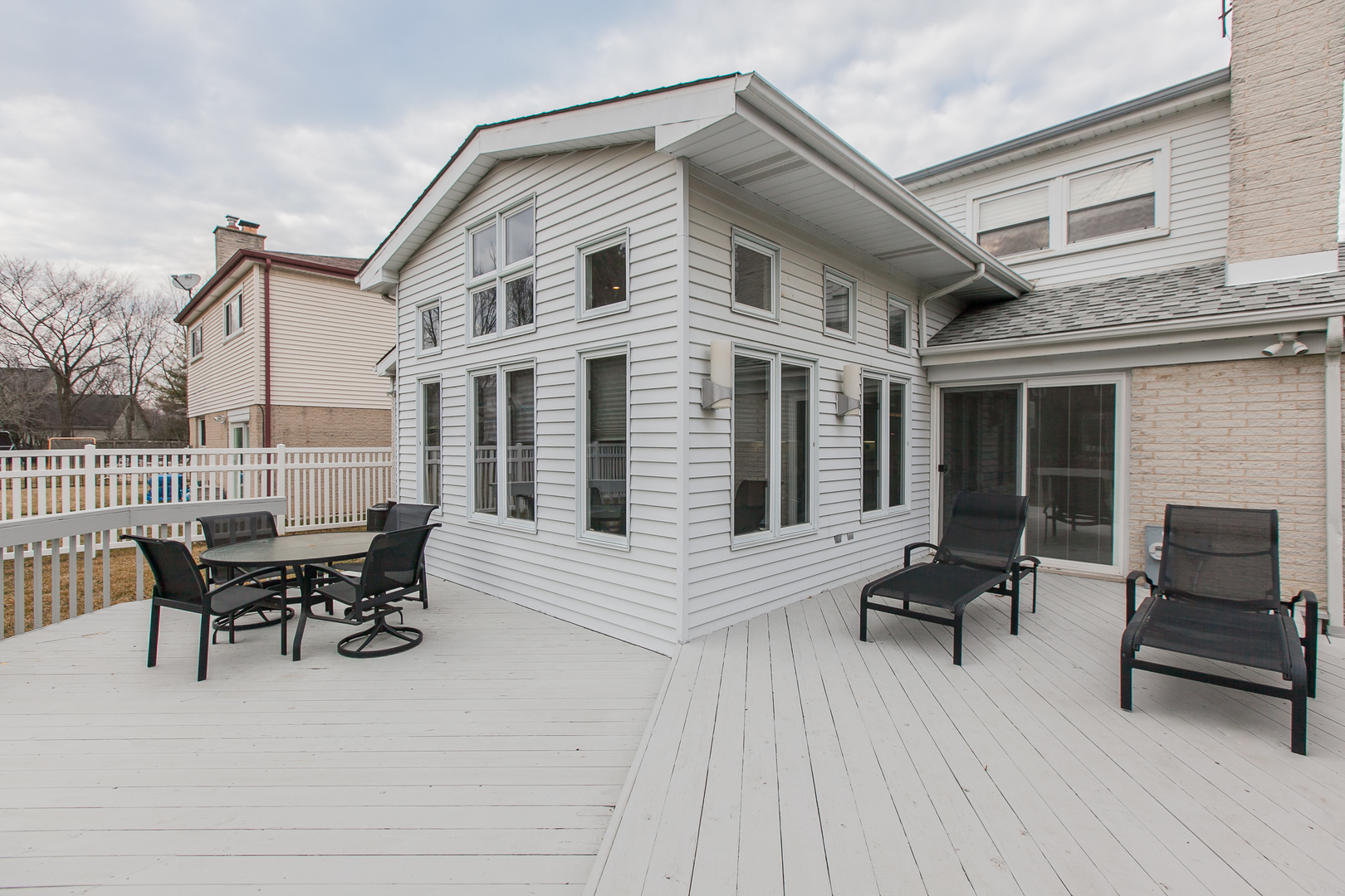 1958 McCraren Road Highland Park, IL 60035 - Photo 3 of 23 a view of a house with chairs and table in a patio
