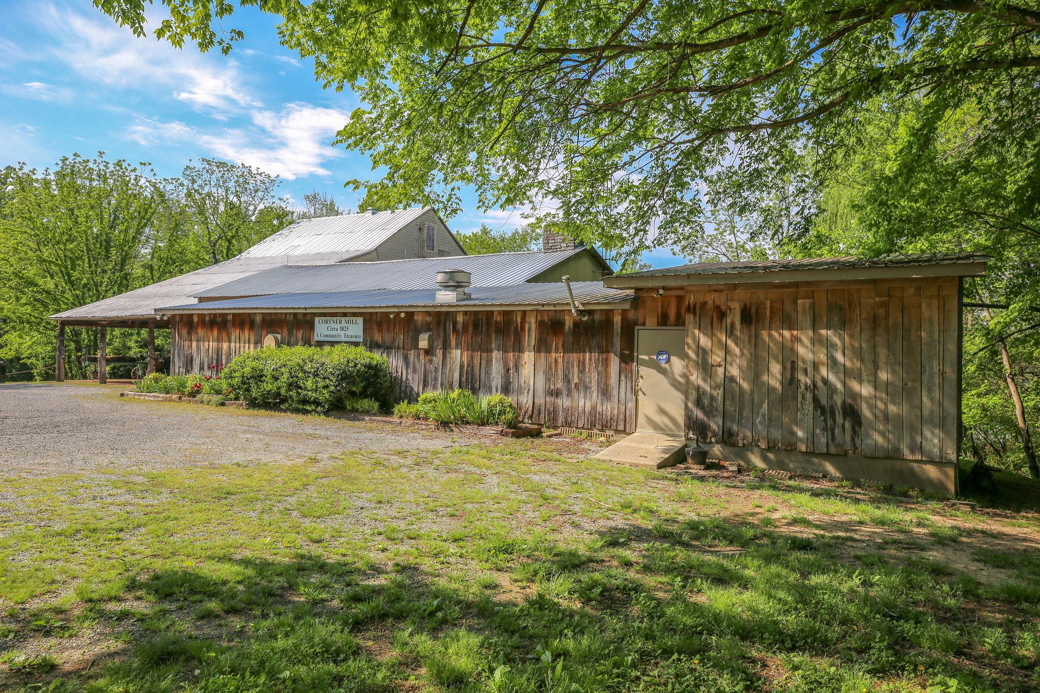 200 Cortner Mill Road Normandy, TN 37360 - Photo 2 of 30 a front view of a house with garden