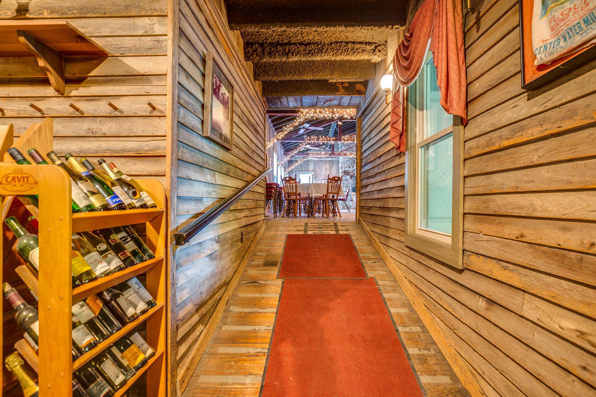 200 Cortner Mill Road Normandy, TN 37360 - Photo 16 of 30 a view of a balcony with wooden floor and stairs