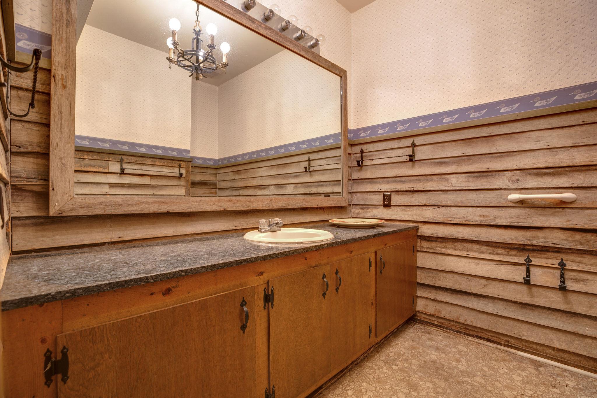 200 Cortner Mill Road Normandy, TN 37360 - Photo 17 of 30 a bathroom with a sink and a mirror