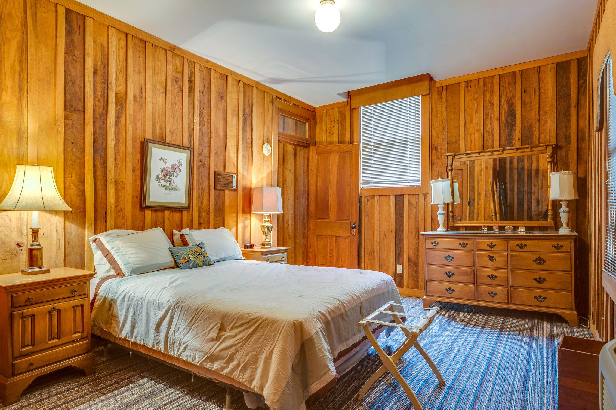200 Cortner Mill Road Normandy, TN 37360 - Photo 25 of 30 a bedroom with a bed and wooden floor