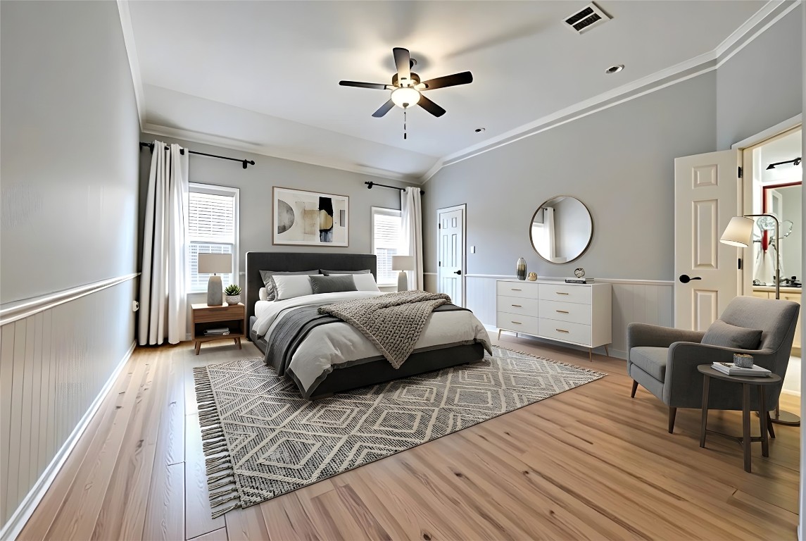 350 Carriage Way Kyle, TX 78640 - Photo 12 of 37 a bedroom with a bed a mirror and a window