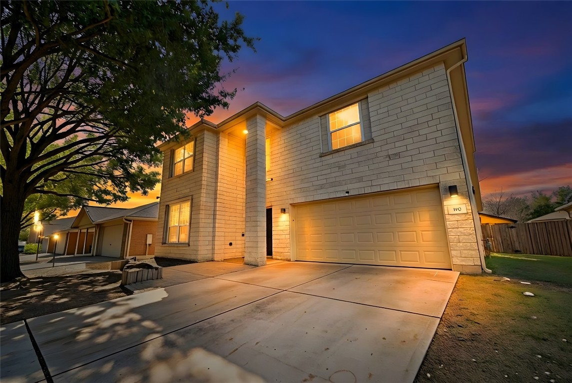 350 Carriage Way Kyle, TX 78640 - Photo 30 of 37 a view of a house with a garage