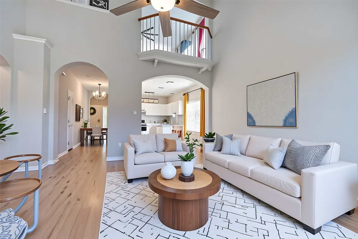 350 Carriage Way Kyle, TX 78640 - Photo 3 of 37 a living room with furniture and a large mirror