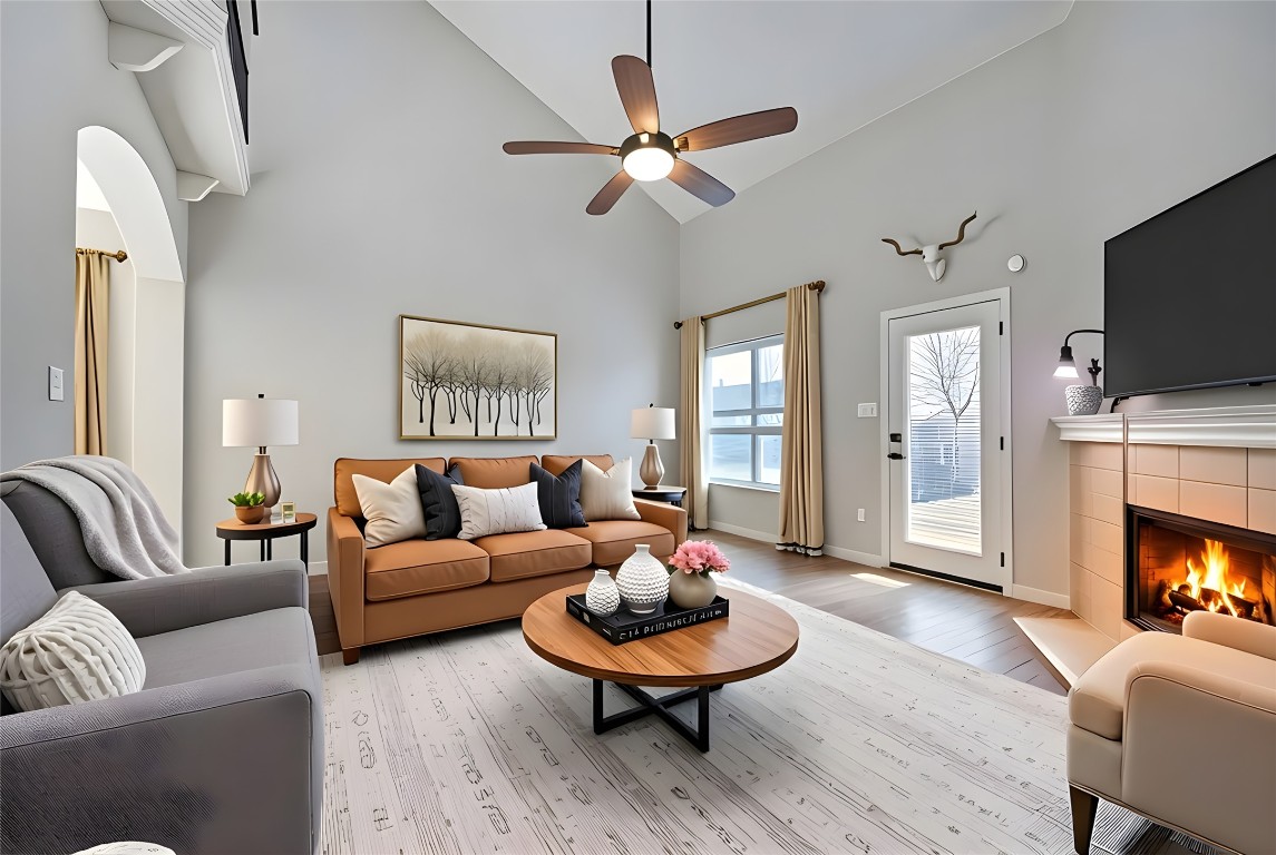 350 Carriage Way Kyle, TX 78640 - Photo 4 of 37 a living room with furniture and a fireplace