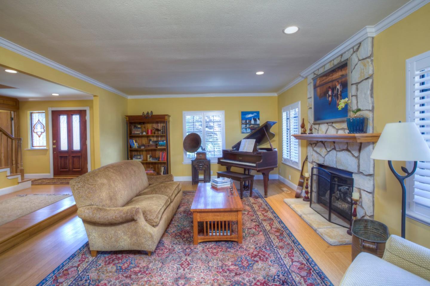 361 Cypress Point Road Half Moon Bay, CA 94019 - Photo 3 of 20 a living room with furniture and a fireplace
