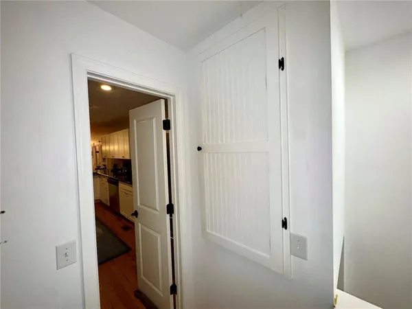 a view of a bathroom from a hallway