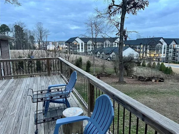 a swimming pool with outdoor seating