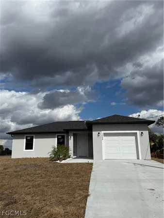 a house with yard in front of it