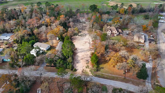 an aerial view of residential house with outdoor space