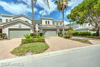 front view of a house with a garden