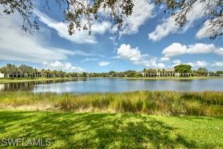 9255 Museo Circle, Unit 204 Naples, FL 34114 - Photo 27 of 27 a view of a lake with a city