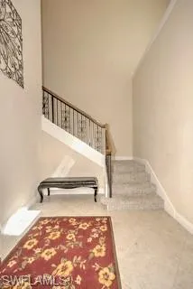 a view of entryway with stairs