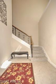 9255 Museo Circle, Unit 204 Naples, FL 34114 - Photo 3 of 27 a view of entryway with stairs