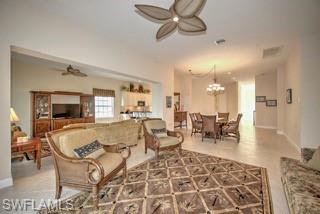 9255 Museo Circle, Unit 204 Naples, FL 34114 - Photo 10 of 27 a living room with furniture and a dining table