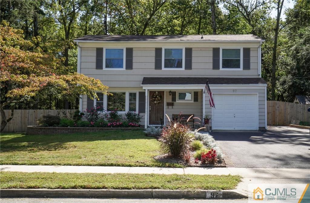 97 Rieder Road Spotswood, NJ 08884 - Photo 1 of 37 a front view of a house with a yard