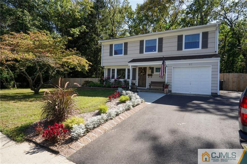 97 Rieder Road Spotswood, NJ 08884 - Photo 2 of 37 a front view of a house with garden