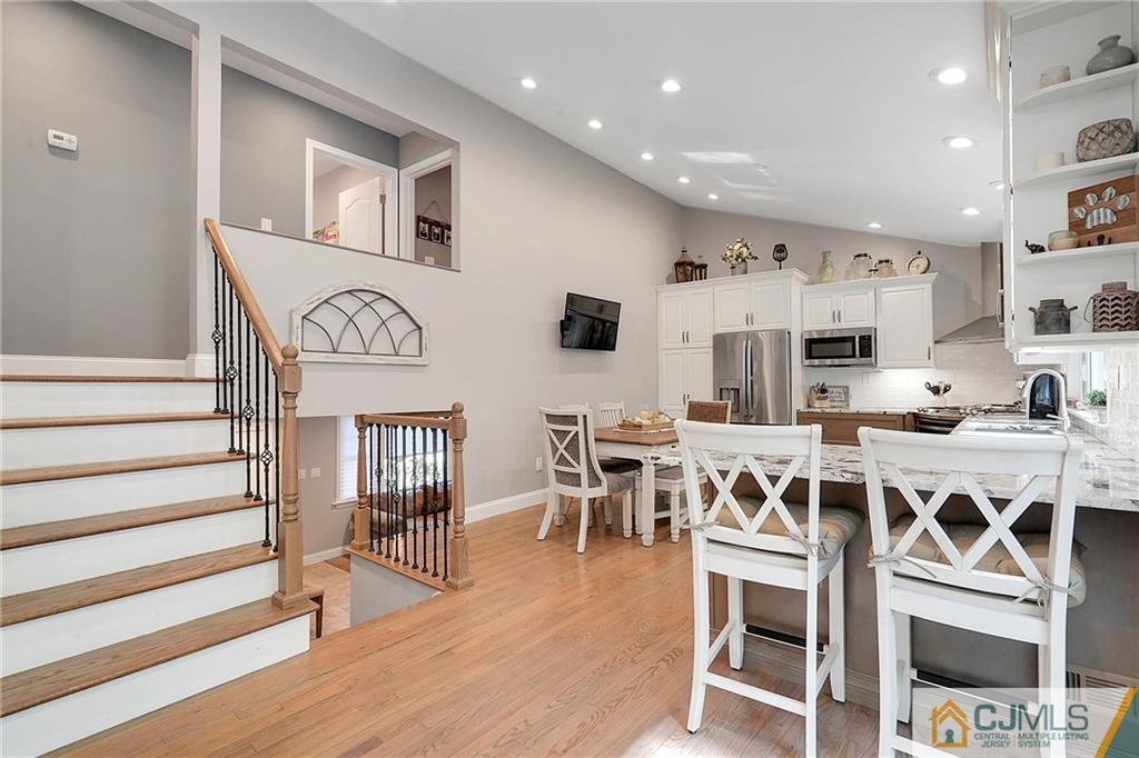 97 Rieder Road Spotswood, NJ 08884 - Photo 14 of 37 a view of a dining room with furniture and wooden floor
