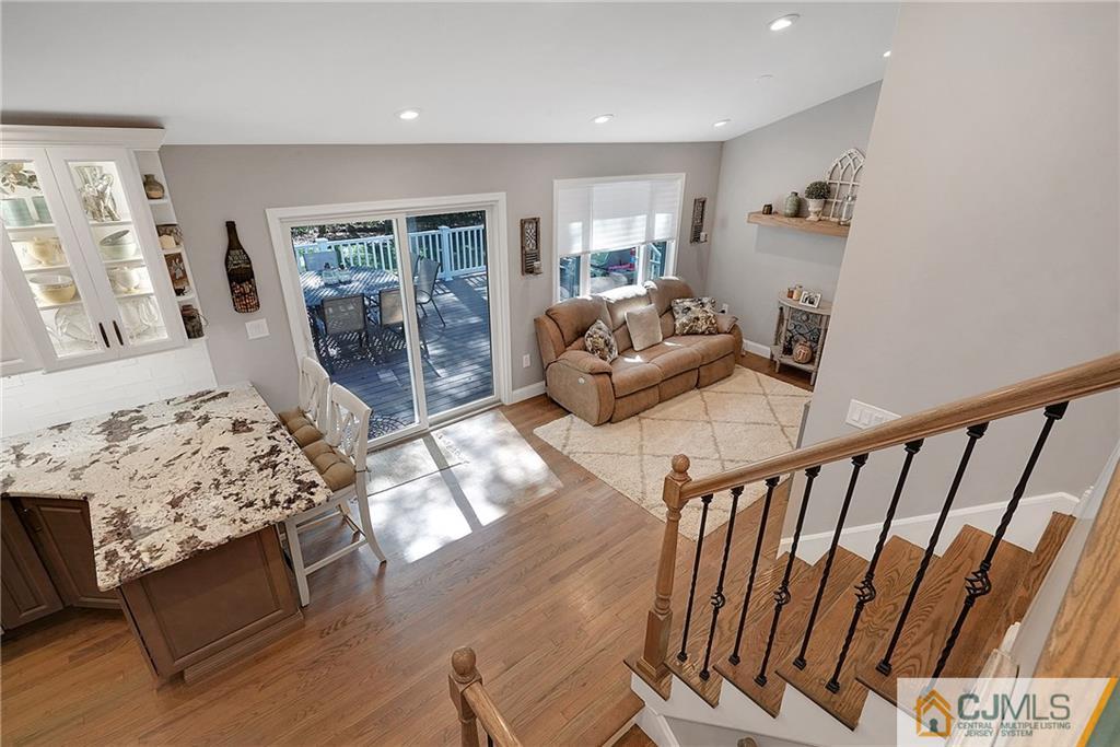 97 Rieder Road Spotswood, NJ 08884 - Photo 17 of 37 a living room with furniture and a fireplace
