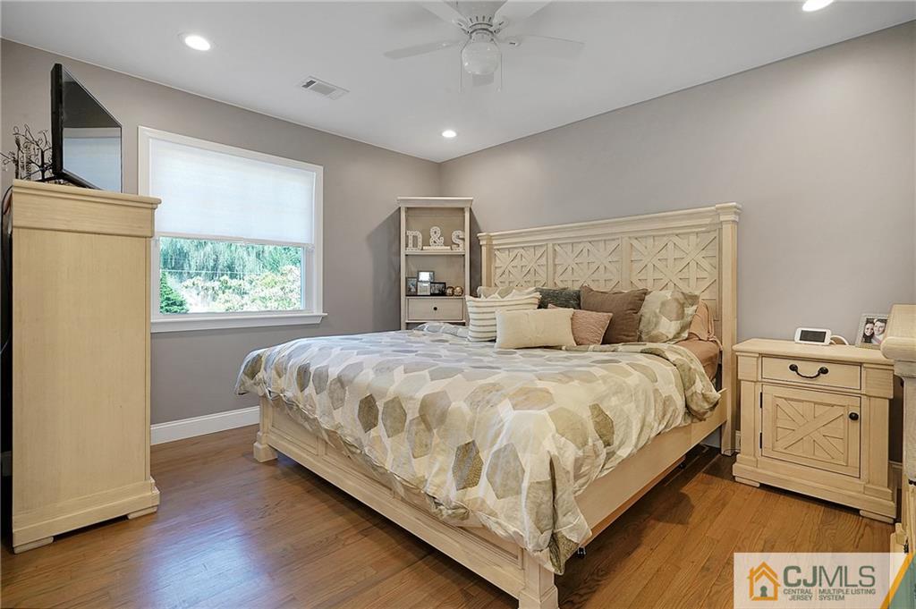 97 Rieder Road Spotswood, NJ 08884 - Photo 24 of 37 a bedroom with a bed and a window