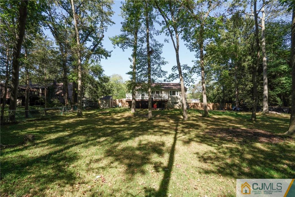 97 Rieder Road Spotswood, NJ 08884 - Photo 30 of 37 a view of a park with large trees