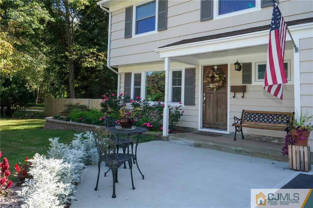 97 Rieder Road Spotswood, NJ 08884 - Photo 4 of 37 a view of a house with backyard sitting area and garden