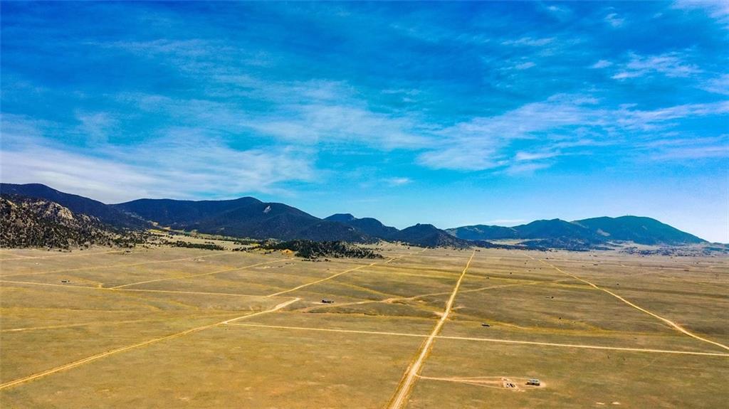 4496 Mesa Road Hartsel, CO 80449 - Photo 1 of 16 a view of an outdoor space and tennis court