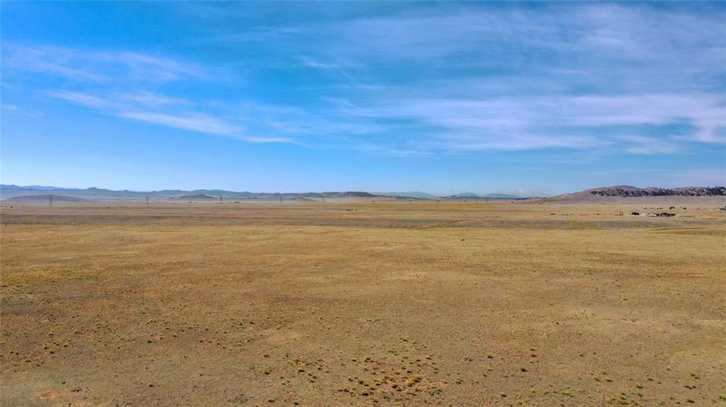 4496 Mesa Road Hartsel, CO 80449 - Photo 2 of 16 a view of an ocean and beach