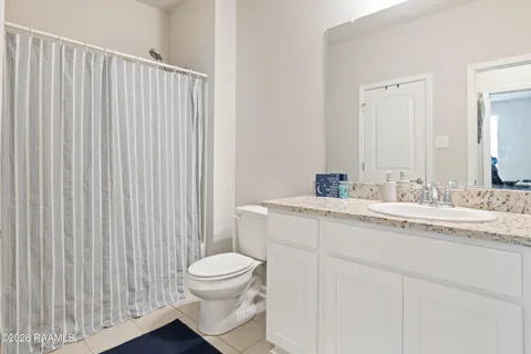 $315,000 | 107 Rue Chateau Royal Drive, Youngsville, LA 70592