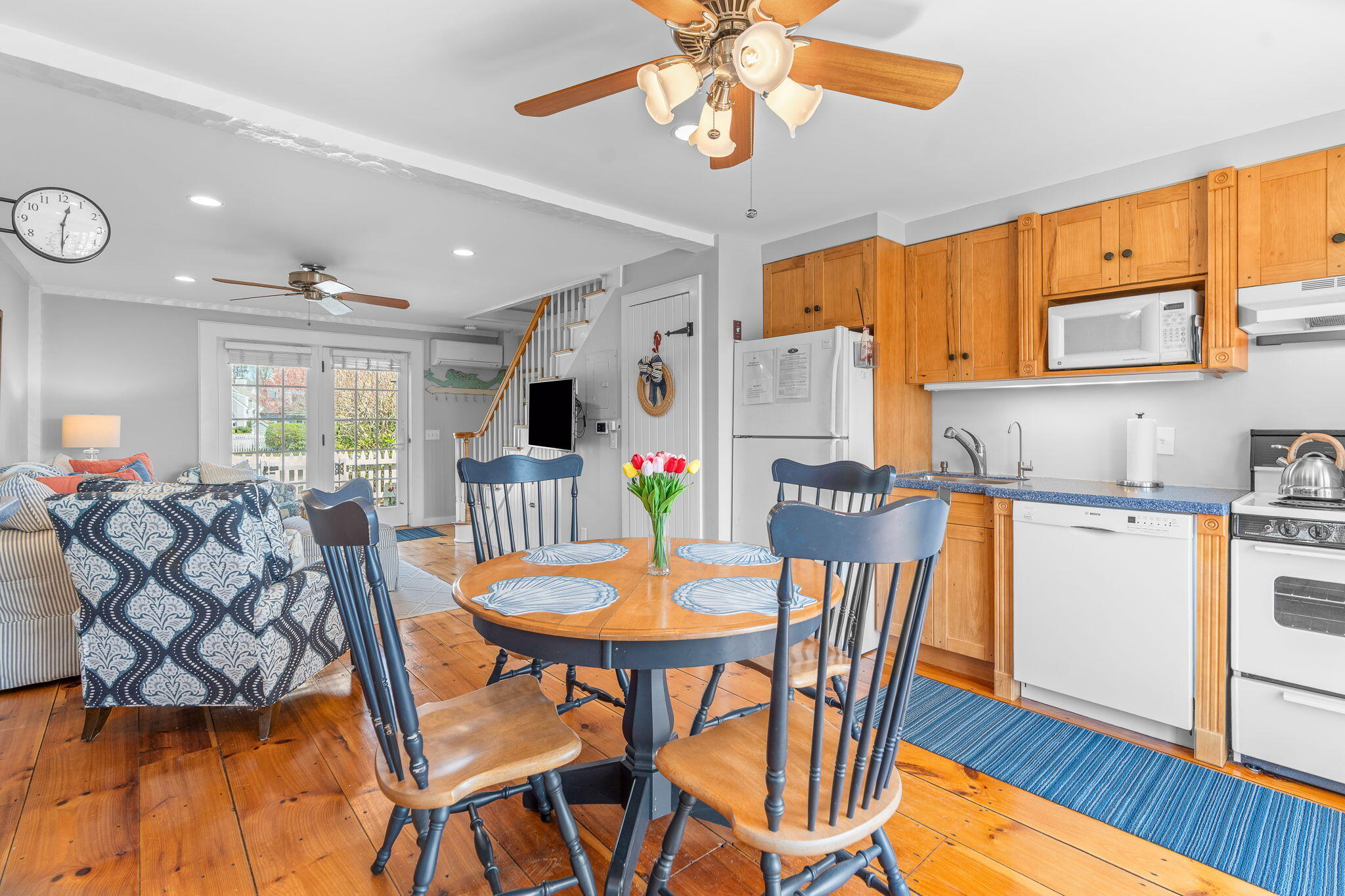 4 Race Point Road, Unit 4 Mashpee, MA 02649 - Photo 13 of 43 a view of a dining room with furniture window and wooden floor
