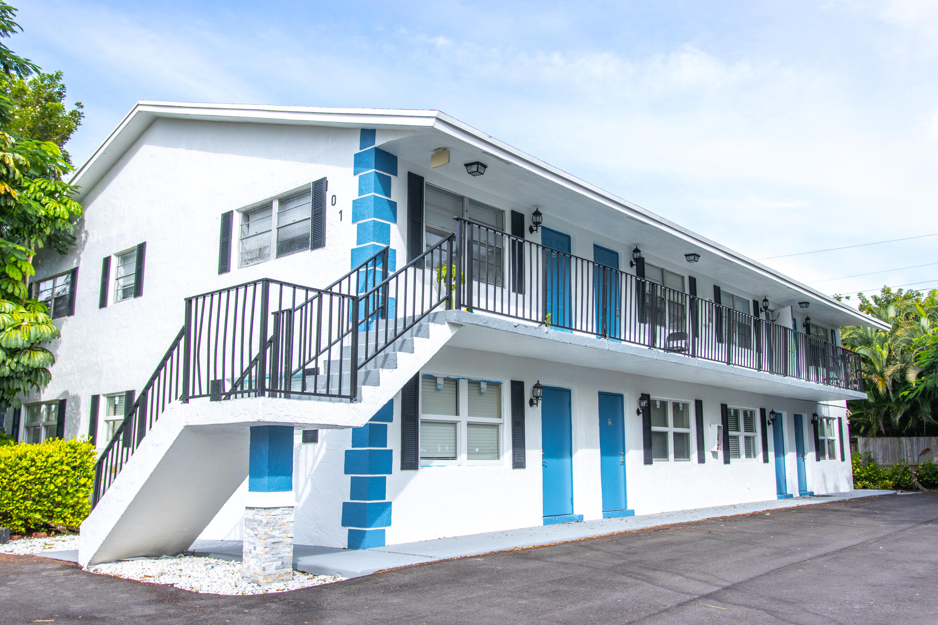 101 Northeast 4th Street, Unit 2 Delray Beach, FL 33444 - Photo 3 of 13 a front view of a house with a porch