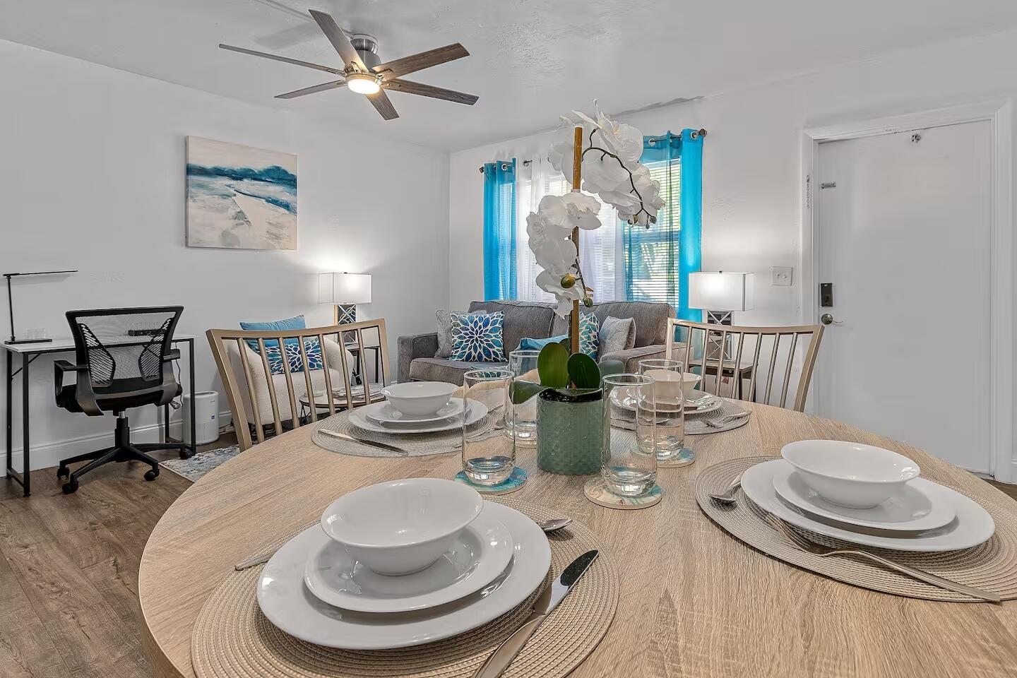 101 Northeast 4th Street, Unit 2 Delray Beach, FL 33444 - Photo 7 of 13 a dining room with furniture a rug and wooden floor