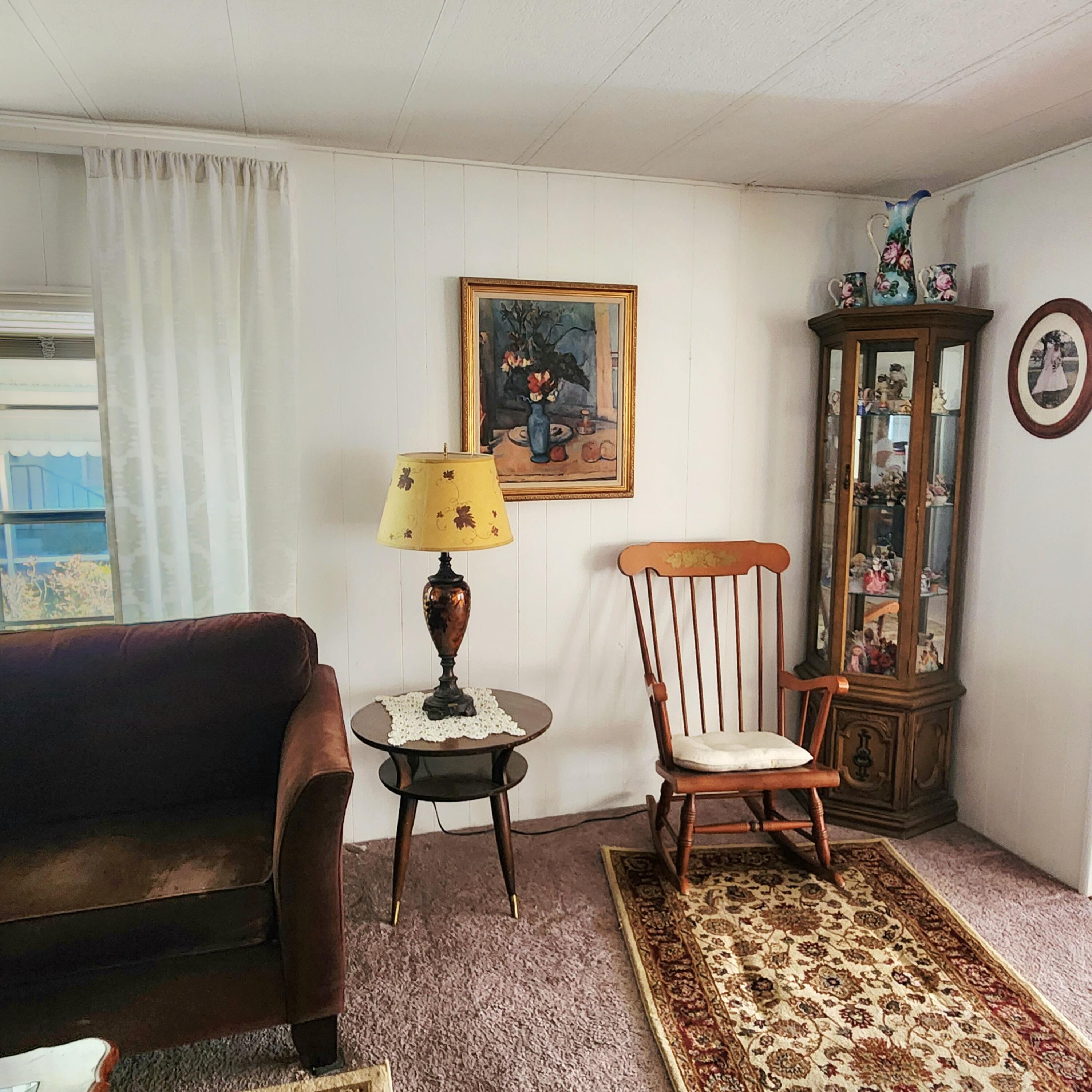 98 Camino Del Rio Port St. Lucie, FL 34952 - Photo 14 of 60 a living room with furniture and a window