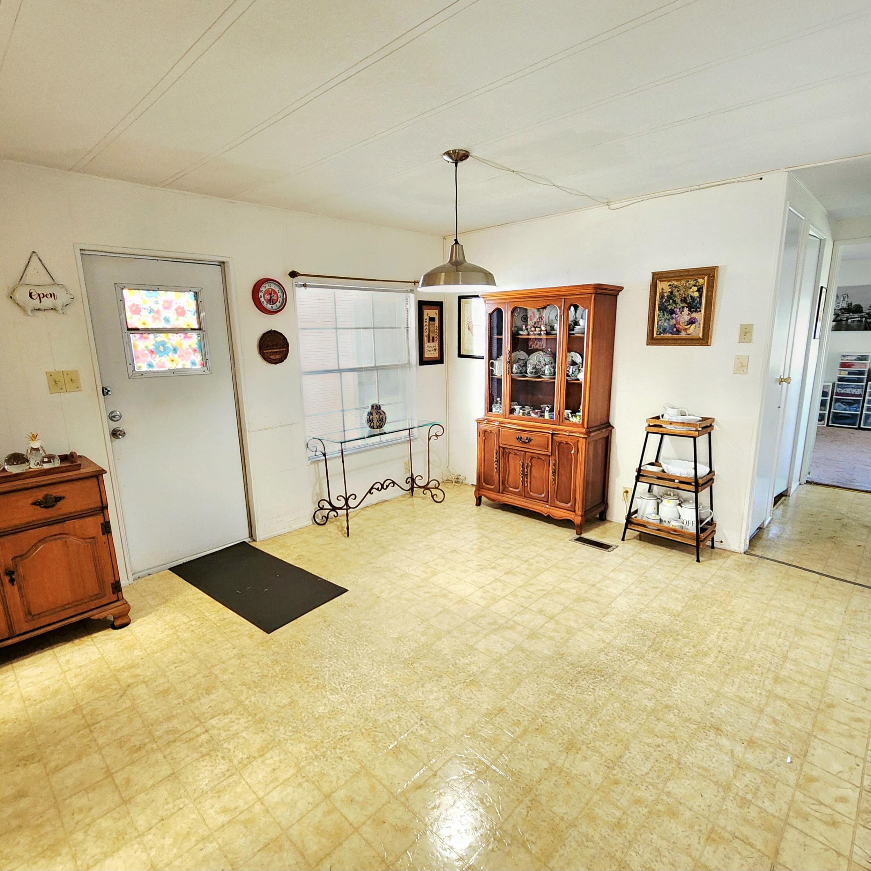 98 Camino Del Rio Port St. Lucie, FL 34952 - Photo 24 of 60 a bedroom with furniture and window